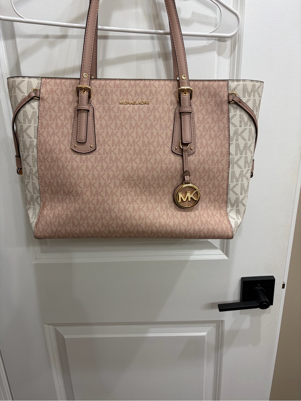 Michael Kors voyager purse. Blush Pink and vanilla Logo with Gold Hardware